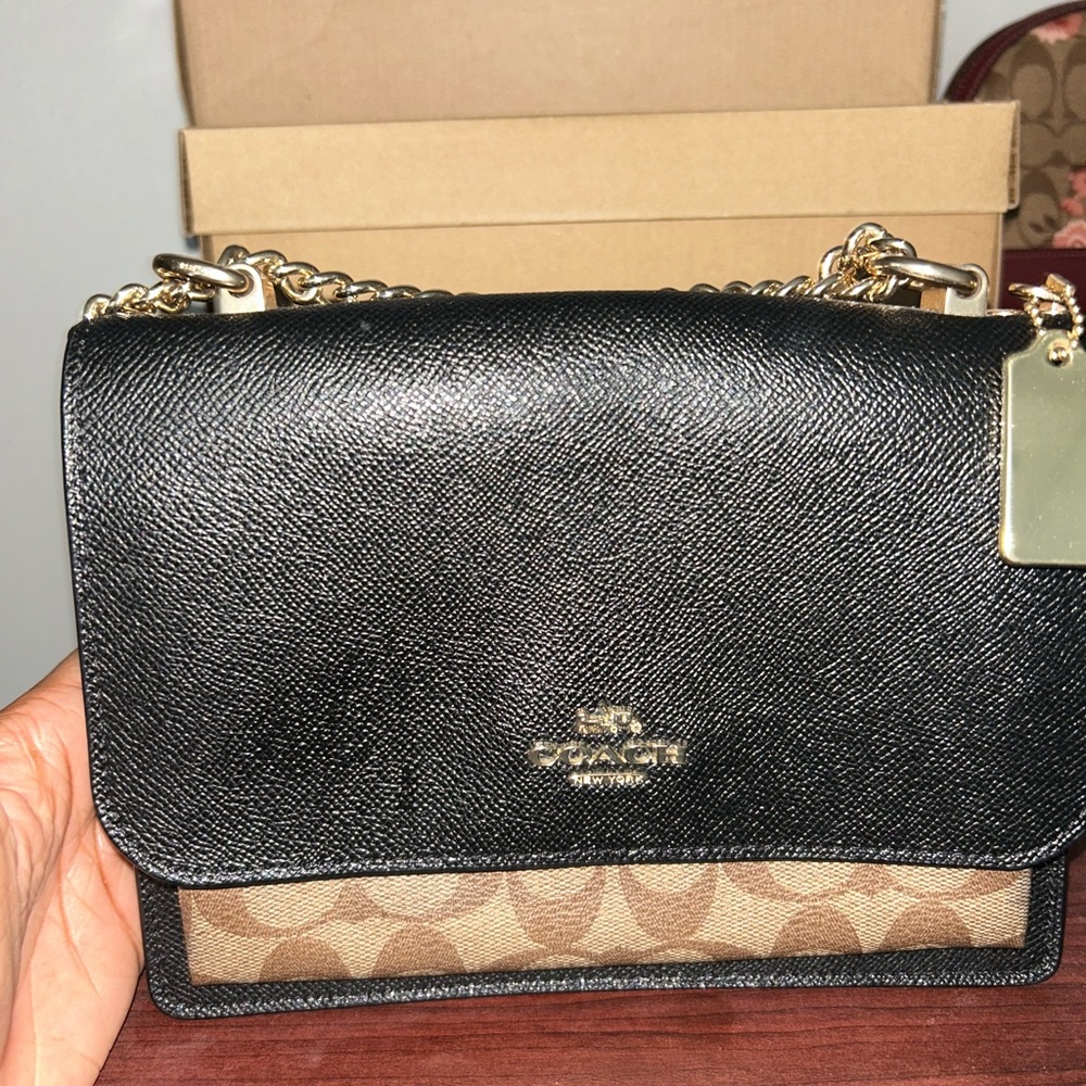 Coach Black and Tan Crossbody Bag with Structured Design